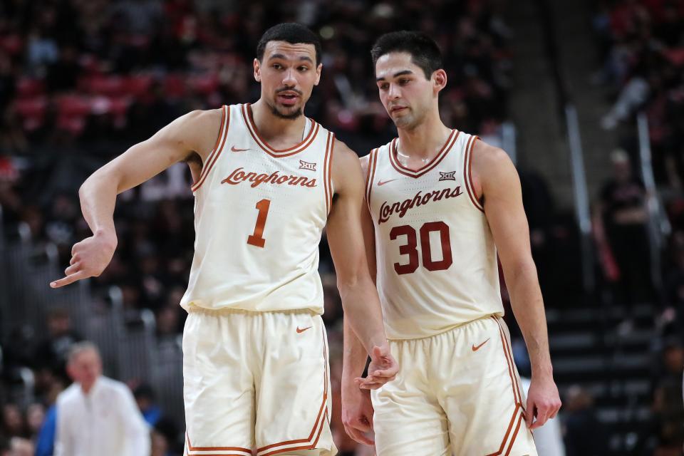 Texas forwards Dylan Disu, left, and Brock Cunningham, right, both grew up in the Austin area, starred at local Hendrickson and Westlake high schools, and will play their final home games as Texas Longhorns in Saturday's regular-season finale at Moody Center against Oklahoma.