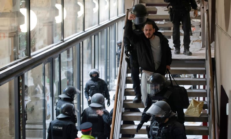 Spanish rapper Pablo Hasel is detained by riot police inside of University of Lleida