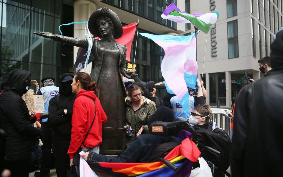 Trans protesters and their allies congregated around the Emmeline Pankhurst statue in Manchester on Sunday - Barbara Cook / Alamy Live News