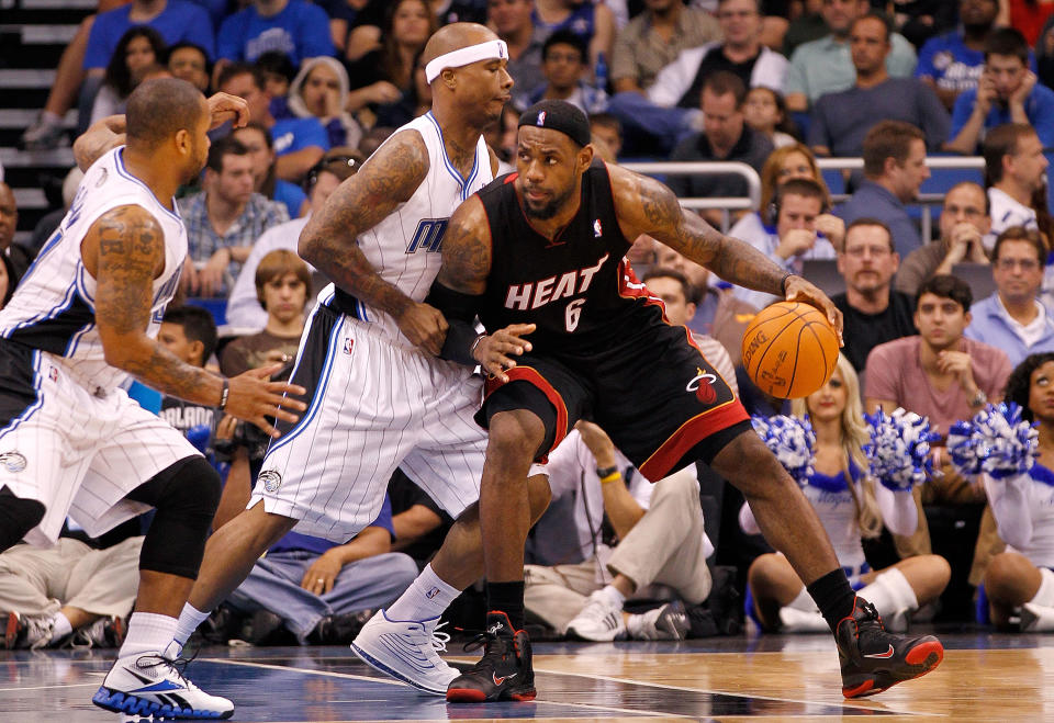 ORLANDO, FL - DECEMBER 21: LeBron James #6 of the Miami Heat posts up against Quentin Richardson #5 of the Orlando Magic during a preseason game at Amway Center on December 21, 2011 in Orlando, Florida. (Photo by Mike Ehrmann/Getty Images)