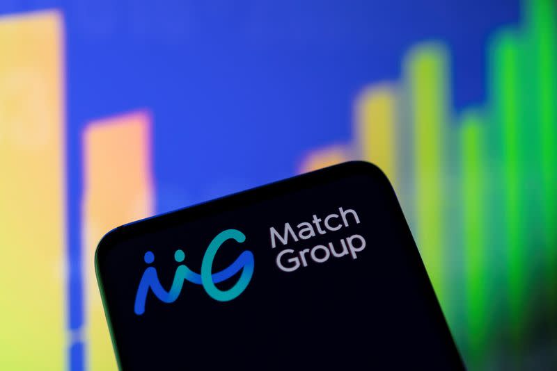 Illustration shows Match Group logo and stock graph