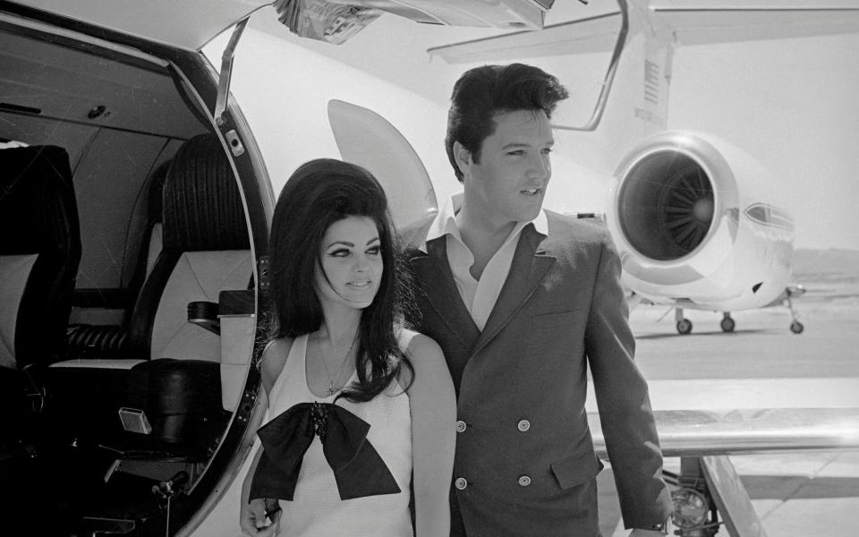 Elvis and his wife Priscilla following their wedding in Vegas in 1967 - Bettmann