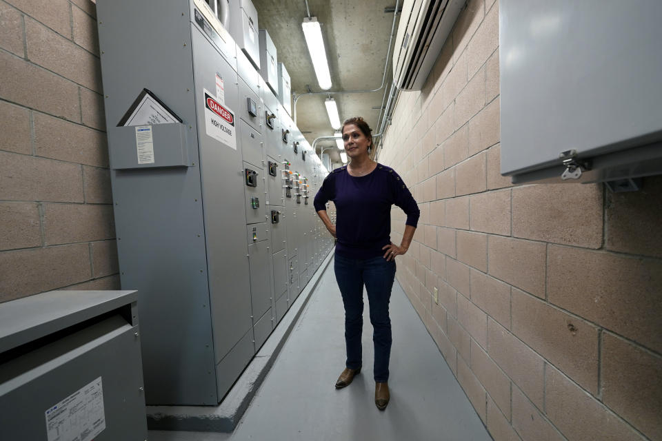 Sonia Lambert, General Manager of Cameron County Irrigation District #2, visits the district’s pump station, Wednesday, Sept. 15, 2021, in San Benito, Texas. Across the Rio Grande Valley, a multimillion-dollar crop industry and fast-growing cities get water from an irrigation system designed nearly a century ago for agriculture. (AP Photo/Eric Gay)