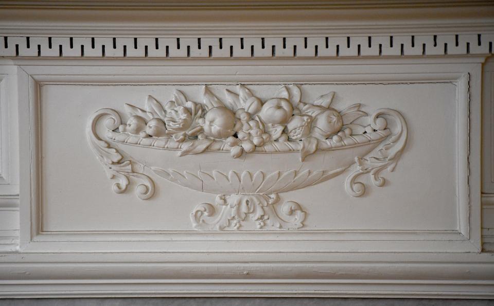 Hand-carved fireplace detail at 251 Salisbury St., Worcester.