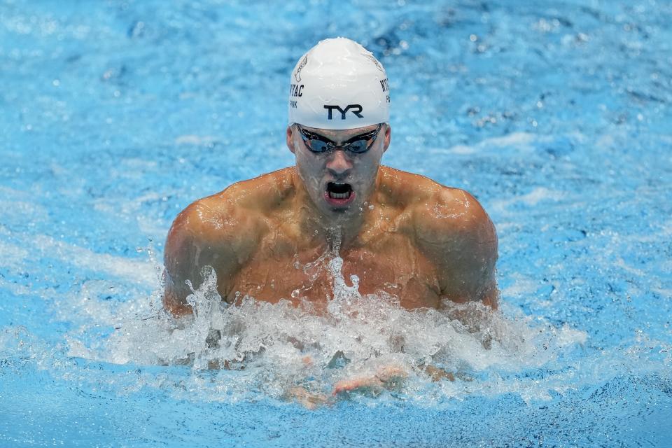 Nic Fink swims during the Men's 100 breaststroke preliminaries Saturday, June 15, 2024, at the US Swimming Olympic Trials in Indianapolis. (AP Photo/Darron Cummings)