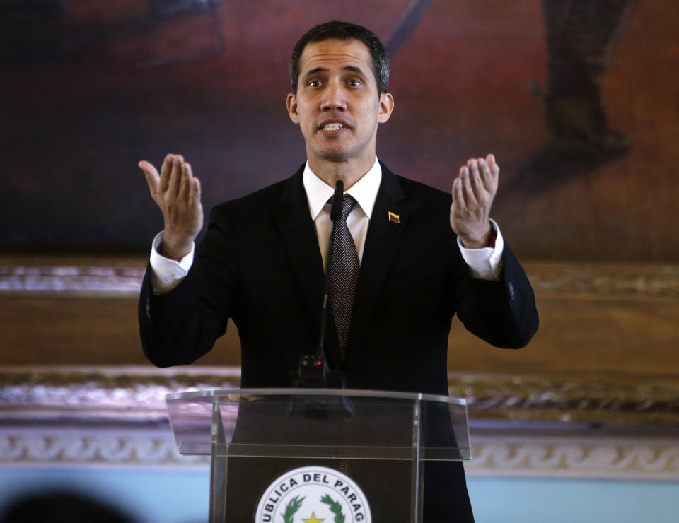 Venezuela's self-proclaimed interim president Juan Guaido talks during a joint press conference with his Paraguayan counterpart during an official visit, in Asuncion, Paraguay, Friday, March 1, 2019. Guaido met with Paraguay's President Abdo Benitez, who recognizes Guaido as Venezuela's leader and has taken a hard line against Venezuelan President Nicolas Maduro. (AP Photo/Jorge Saenz)