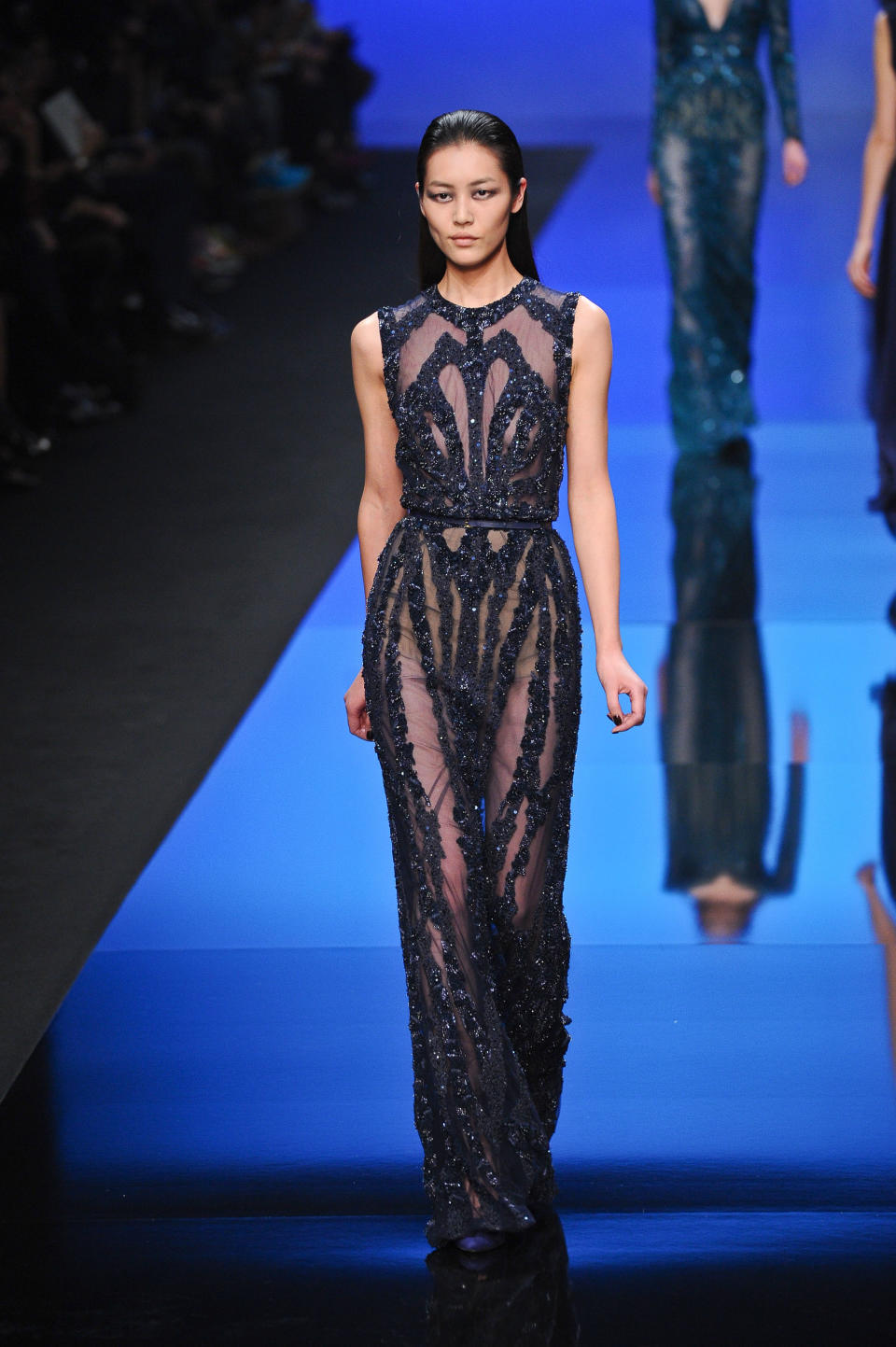 A model wears a creation by fashion designer Elie Saab for his Ready to Wear's Fall-Winter 2013-2014 fashion collection presented, Wednesday, March 6, 2013 in Paris. (AP Photo/Zacharie Scheurer)