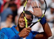 Tennis - Monte Carlo Masters - Monaco, 15/04/2016. Jo-Wilfried Tsonga of France reacts after defeating Roger Federer of Switzerland. REUTERS/Eric Gaillard