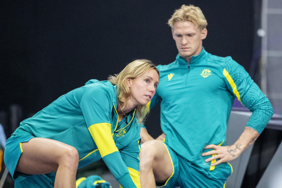 Emma McKeon and Cody Simpson, pictured here on the pool deck at the Commonwealth Games.