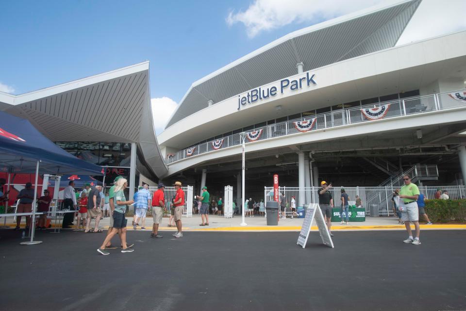 Fans file into JetBlue Park before the MLB spring training matchup between the Minnesota Twins and the Boston Red Sox, Thursday, March 17, 2022, at JetBlue Park in Fort Myers, Fla.Today marked the first full-capacity spring training game in SWFL since the pandemic in 2022.