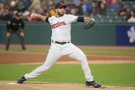 Cleveland Guardians starting pitcher Aaron Civale delivers to a Kansas City Royals batter during the first inning of a baseball game in Cleveland, Friday, Sept. 30, 2022. (AP Photo/Phil Long)