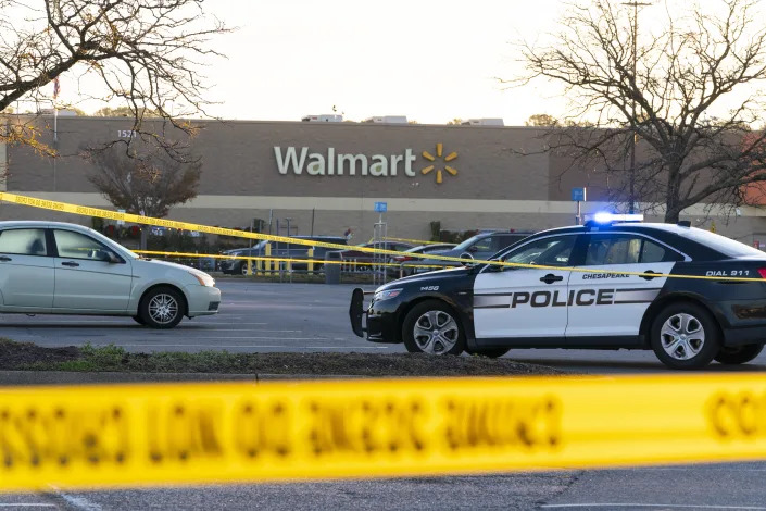 Law enforcement at the scene of a mass shooting at a Walmart store in Chesapeake, Va.