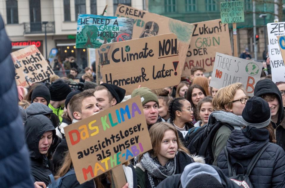 <span class="caption">Students protesting at a climate rally in Berlin, Germany, March 2019. </span> <span class="attribution"><a class="link " href="https://unsplash.com/photos/DwgPkR02Wpc" rel="nofollow noopener" target="_blank" data-ylk="slk:(Mika Baumeister/Unsplash);elm:context_link;itc:0;sec:content-canvas">(Mika Baumeister/Unsplash)</a></span>