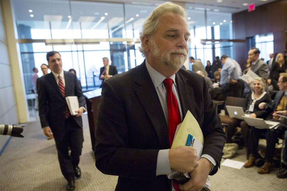 Attorney Randy Mastro exits a news conference following the release of his independent review of New Jersey Gov. Chris Christie's government in New York, Thursday, March 27, 2014. Mastro, with the law firm hired by New Jersey Gov. Chris Christie, said Thursday that the governor was not involved in a plot to create gridlock near a major bridge as part of a political retribution scheme. (AP Photo/Brendan McDermid, POOL)