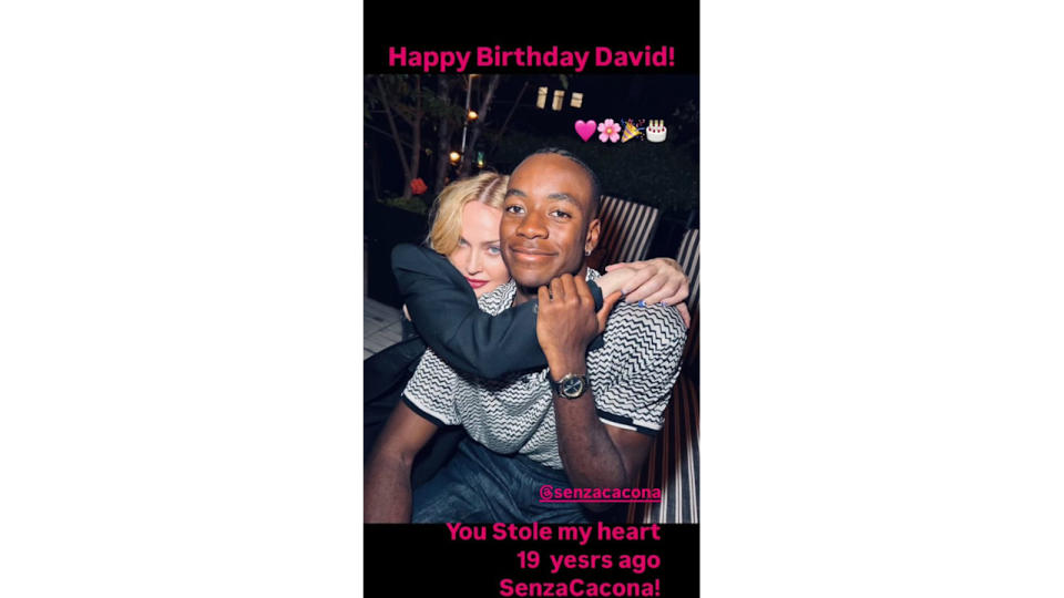 Screenshot of Madonna's Stories with a picture of Madonna hugging son David 