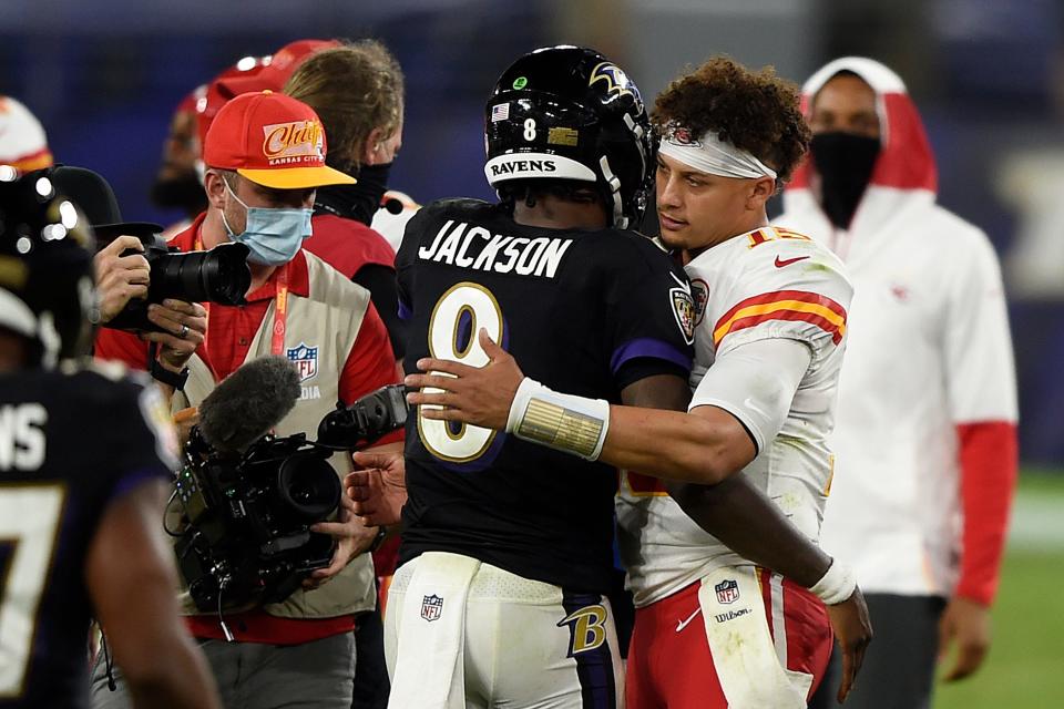 Baltimore Ravens quarterback Lamar Jackson and Kansas City Chiefs quarterback Patrick Mahomes, right, will face each other in the 2024 AFC championship game on Sunday.