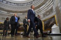 House Intelligence Committee Chairman Adam Schiff, D-Calif., right, leads the group of impeachment managers through the rotunda on their way to the Senate on Jan. 16, 2020.