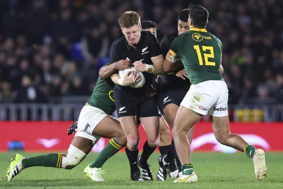 New Zealand's Jordie Barrett runs at the defense during the Rugby Championship test match between the All Blacks and South Africa at Mt Smart Stadium in Auckland, New Zealand, Saturday, July 15, 2023. ( Aaron Gillions/Photosport via AP)