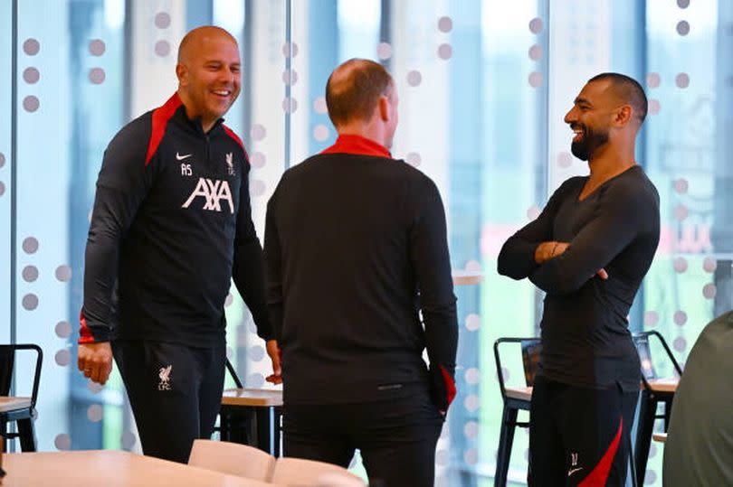 Salah meeting new manager Arne Slot for the first time, with the pair laughing and joking at the club's training ground