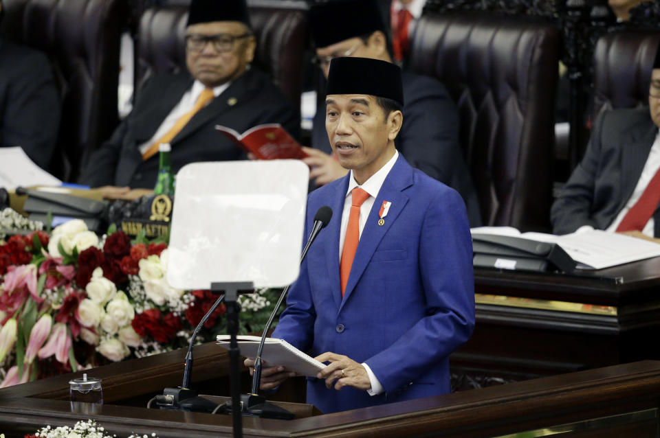 Indonesia's President Joko Widodo delivers his state of the nation address ahead of the country's Independence Day at the parliament building in Jakarta, Indonesia, Friday, Aug. 16, 2019. Indonesia celebrates the 74th anniversary of its independence from the Netherlands on Saturday, Aug. 17. (AP Photo/Achmad Ibrahim)