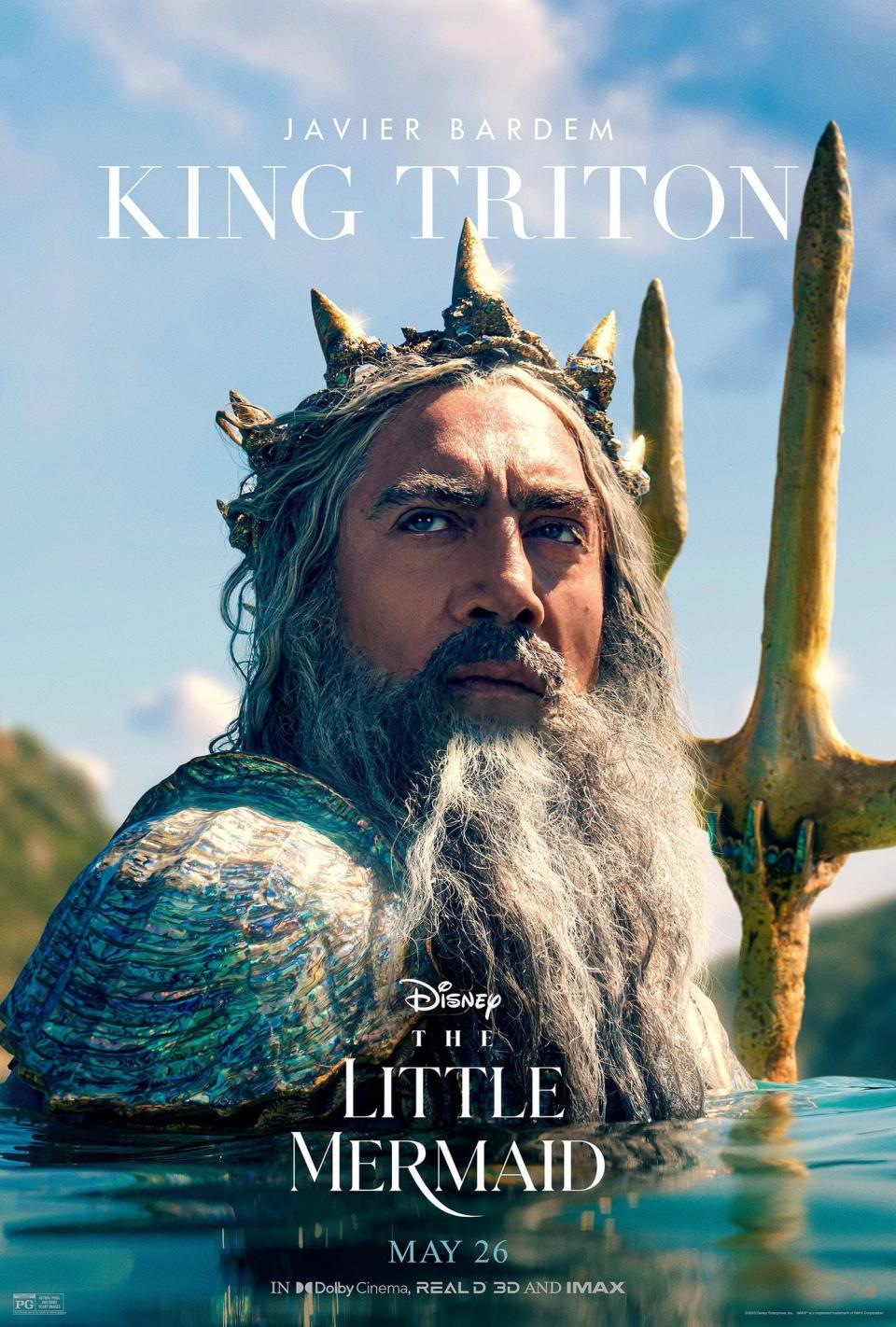 Javier Bardem as King Triton emerges from the sea