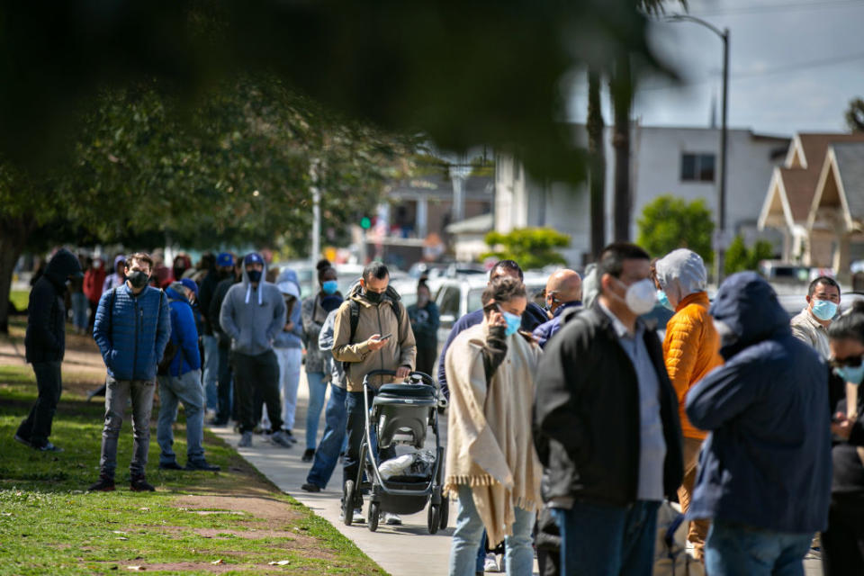 People waiting to receive vaccinations