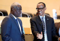 Rwandan President Paul Kagame talks to African Union Chairperson Moussa Faki Mahamat during the High Level Consultation Meetings of Heads of State and Government on the situation in the Democratic Republic of Congo at the African Union Headquarters in Addis Ababa, Ethiopia January 17, 2019. REUTERS/Tiksa Negeri