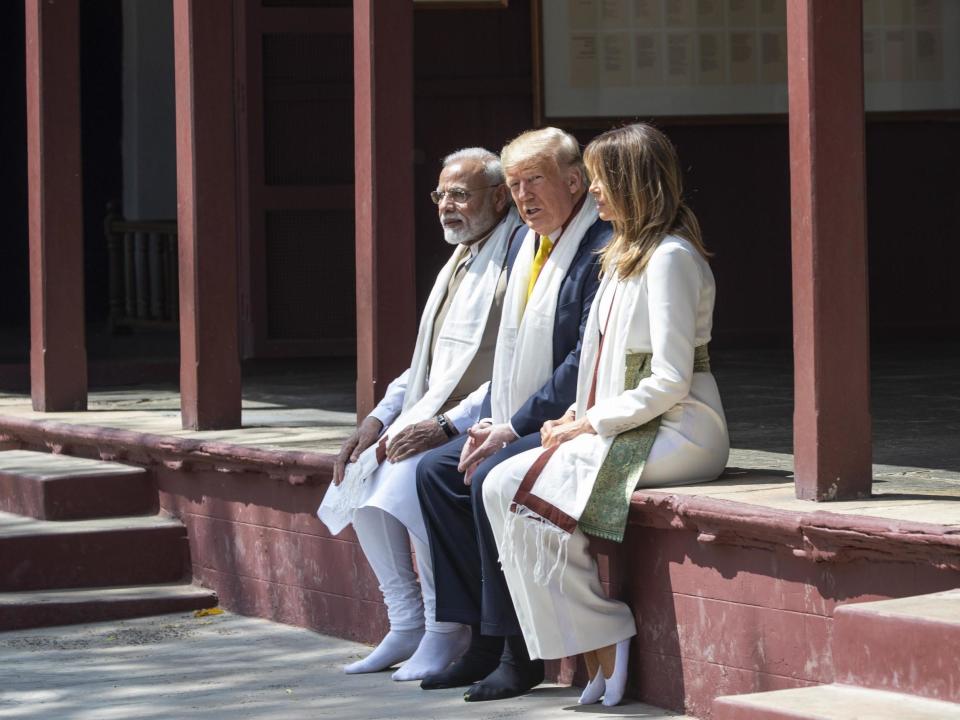 Donald Trump, his wife Melania and the prime minster of India Narendra Modi during their visit to the Gandhi Ashram: AP