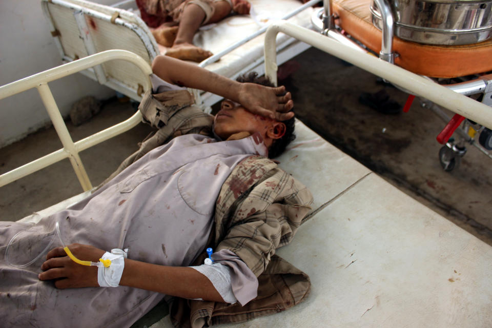 <p>Wounded Yemeni children lay on a bed receiving treatment at a hospital after being injured in an alleged Saudi-led airstrike in the northern province of Saada, Yemen, Aug. 9, 2018. (Photo: Stringer/EPA-EFE/REX/Shutterstock) </p>