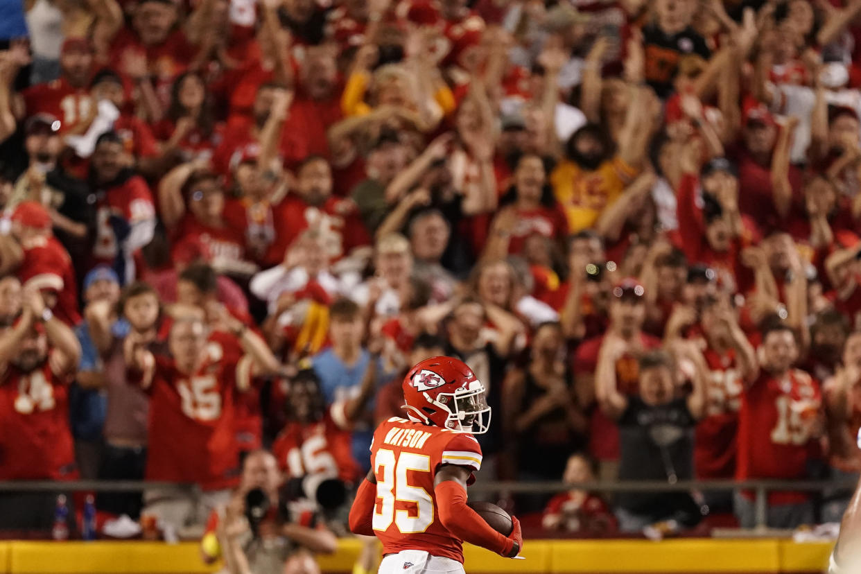 Kansas City Chiefs cornerback Jaylen Watson runs an interception back for a touchdown in a win over the Chargers on Thursday in Kansas City, Mo. (AP Photo/Charlie Riedel)