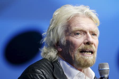 Richard Branson unveils the new SpaceShipTwo, in Mojave, California, United States, February 19, 2016. REUTERS/Lucy Nicholson