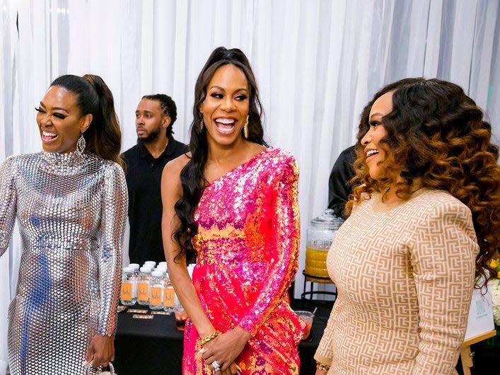 THE REAL HOUSEWIVES OF ATLANTA -- Pictured: (l-r) Kandi Burruss, Kenya Moore, Sanya Richards Ross -- (Photo by: Darnel Williams/Bravo)