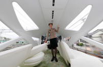 <p>A crew members shows one of the train’s observation decks. (Photo: The Asahi Shimbun via Getty Images) </p>