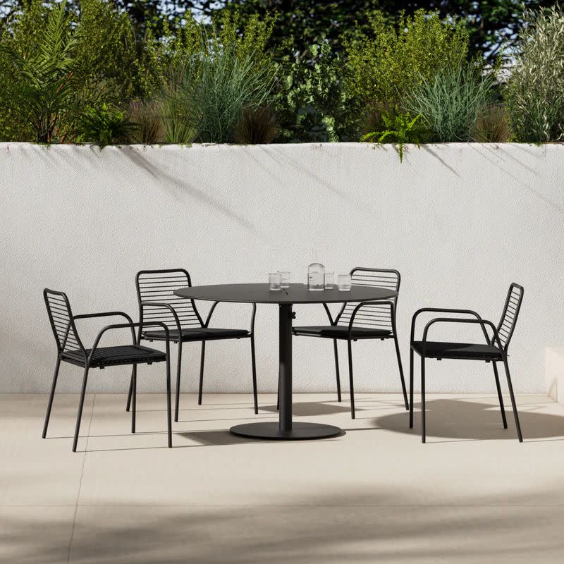 a table and chairs outside