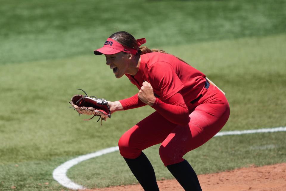 United States starting pitcher Monica Abbott (14) celebrates after a strike out in the sixth inning with bases loaded against Australia during the Tokyo 2020 Olympic Summer Games at Yokohama Baseball Stadium.