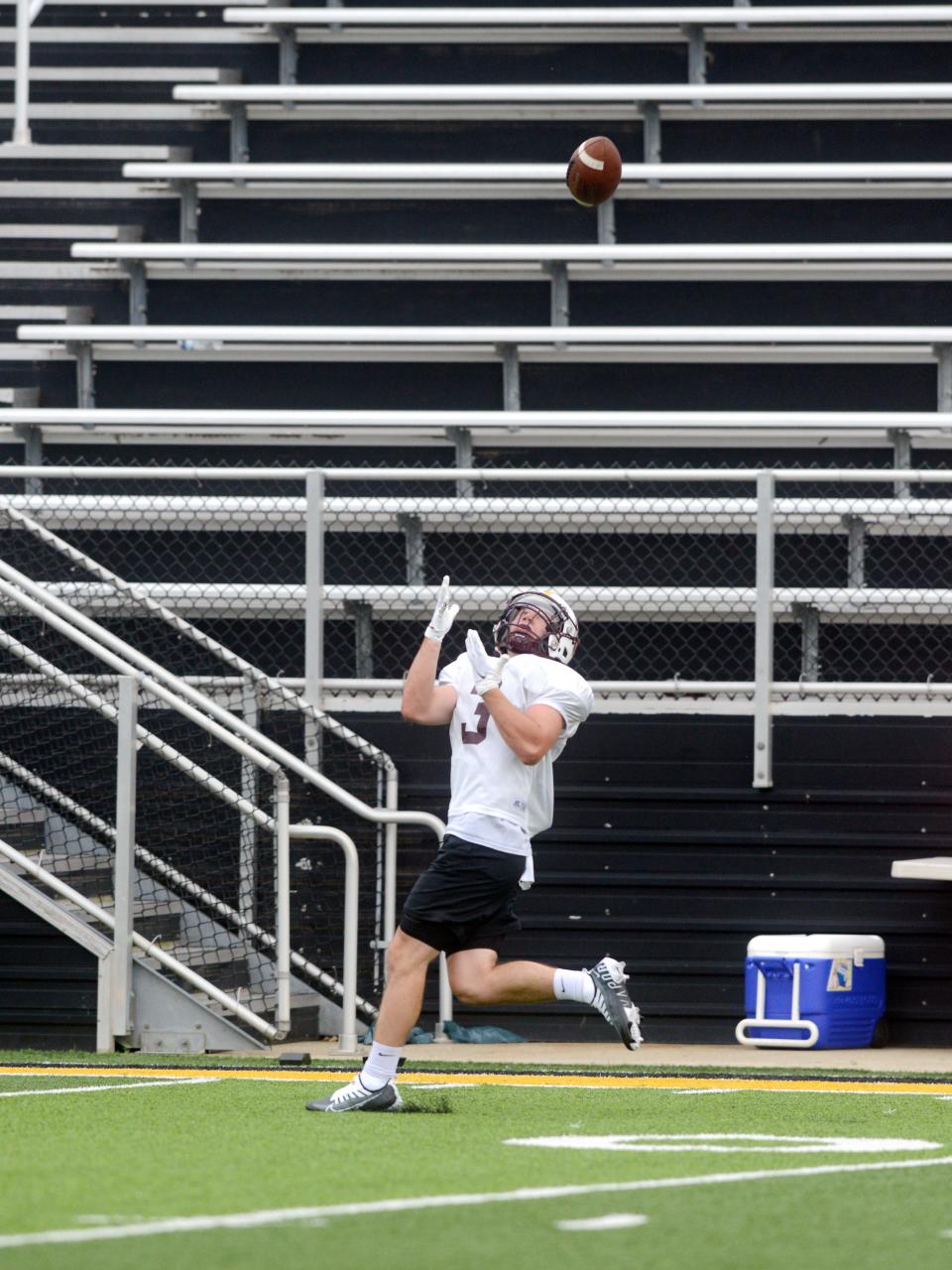 John Glenn's Blade Barclay hauls in a pass during Muskingum Valley League All-Star practice on Monday at Tri-Valley's Jack Anderson Stadium in Dresden.