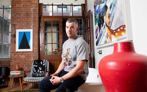 'There is a class divide, but art can bridge that': Russell Tovey with his art collection - Credit: Rii Schroer