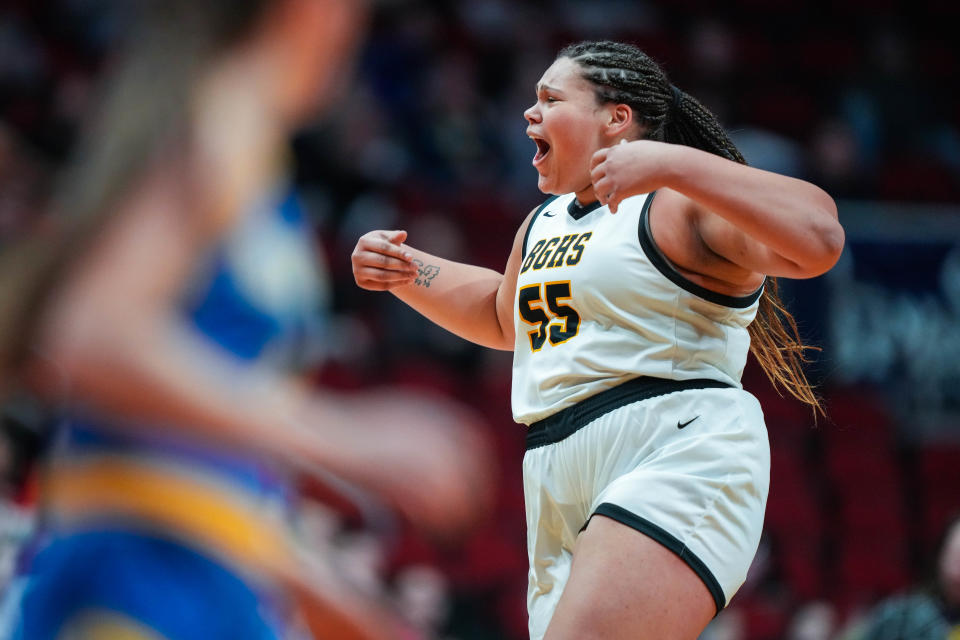 Former Bishop Garrigan center Audi Crooks (55) celebrates a made bucket during the class 1A quarterfinal of the Iowa high school girls state basketball tournament in 2023. Crooks is expected to play a big role during her time at Iowa State.