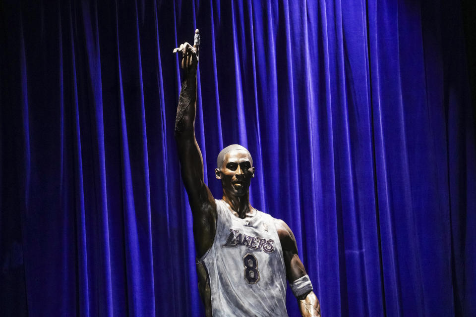 A statue of former Los Angeles Lakers guard Kobe Bryant is seen after its unveiling outside the NBA basketball team's arena, Thursday, Feb. 8, 2024, in Los Angeles. (AP Photo/Eric Thayer)