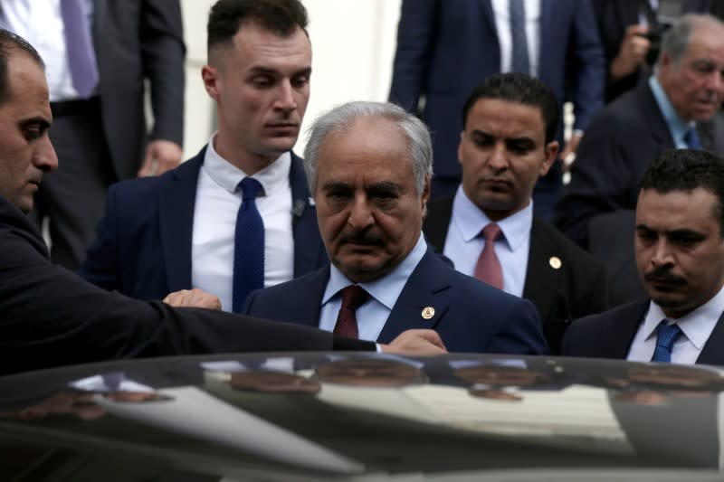 Libya's commander Khalifa Haftar gets into a car after a meeting with Greek Foreign Minister Nikos Dendias at the Foreign Ministry in Athens