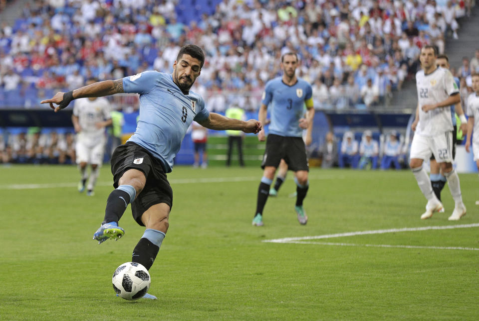 <p>Luis Suarez sets up another attack as Uruguay end the game strongly </p>