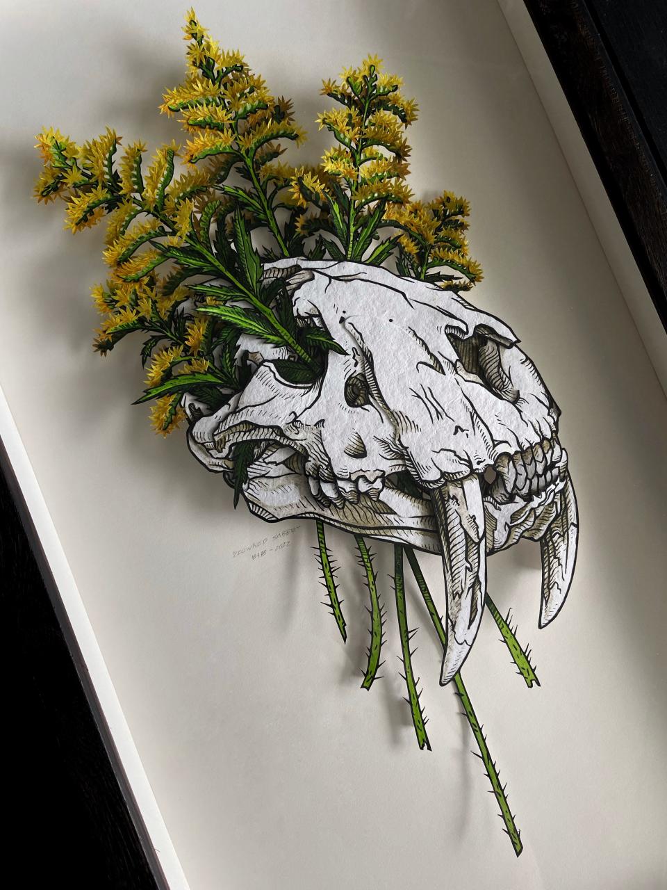 Beastie + Bone artist Stacia Baldwin created a saber-toothed cat skull surrounded by modern day goldenrod, a prolific Midwest flower that is often considered a weed, as part of her major yearlong project focused on North American megafauna and micro ecosystems.