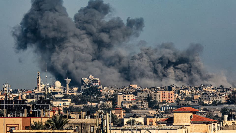 Smoke billows from Israeli bombardment over Khan Younis, as seen from Rafah, Gaza, on December 16. - Said Khatib/AFP/Getty Images