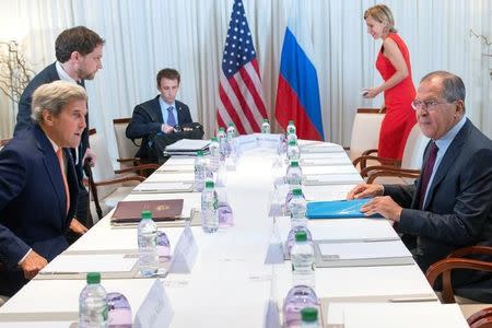 U.S. Secretary of State John Kerry (L) and Russian Foreign Minister Sergei Lavrov (R) during a bilateral meeting focused on the Syrian crisis in Geneva, Switzerland August 26, 2016. REUTERS/Martial Trezzini/Pool