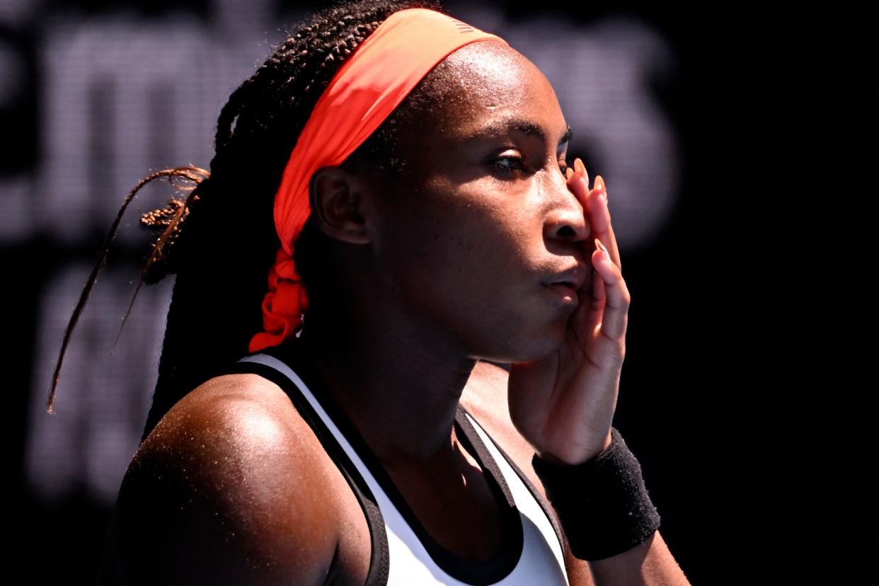 Coco Gauff of the US reacts on a point against Latvia's Jelena Ostapenko during their women's singles match on day seven of the Australian Open tennis tournament in Melbourne on January 22, 2023. - -- IMAGE RESTRICTED TO EDITORIAL USE - STRICTLY NO COMMERCIAL USE -- (Photo by WILLIAM WEST / AFP) / -- IMAGE RESTRICTED TO EDITORIAL USE - STRICTLY NO COMMERCIAL USE -- (Photo by WILLIAM WEST/AFP via Getty Images)