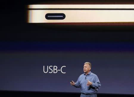 Phil Schiller, senior VP of worldwide marketing for Apple, speaks about Apple's new MacBook's connection cable during an Apple event in San Francisco, California March 9, 2015. REUTERS/Robert Galbraith