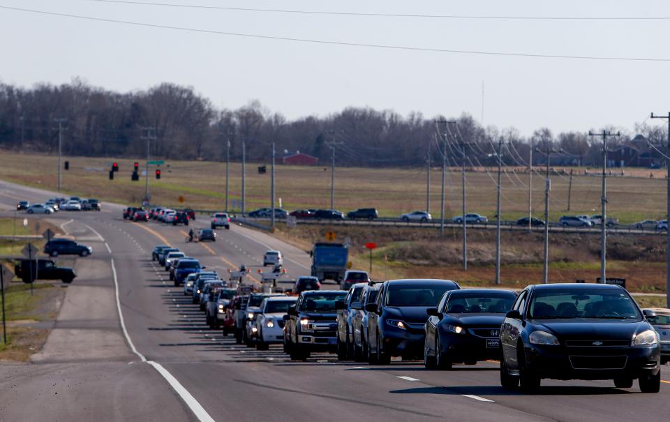 Traffic lines up on Trenton Road. City officials hope Spring Creek Parkway will help reduce the frequency of scenes like this.