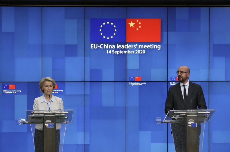 European Council President Charles Michel, right, and European Commission President Ursula von der Leyen attend a press conference following an EU-China virtual summit at the European Council building in Brussels, Monday, Sept. 14, 2020. Michel and Von der Leyen had talks in a videoconference with China's President Xi Jinping and German Chancellor Angela Merkel. (Yves Herman, Pool Photo via AP)