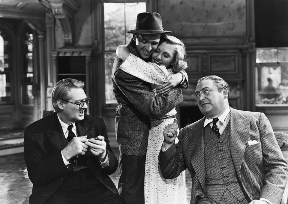 PHOTO: Lionel Barrymore, James Stewart, Jean Arthur and Edward Arnold appear in a scene from the 1938 film 'You Can't Take It with You.' (George Rinhart/Corbis via Getty Images, FILE)