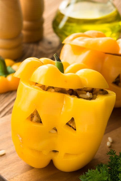 <p>You can use our slow cooker stuffed pepper recipe (or any recipe you prefer!) to create this fun appetizer idea. All you have to do is carve a jack-o'-lantern face in a hollowed-out bell pepper and pack 'em with the good stuff. </p><p>Get the <strong><a href="https://www.womansday.com/food-recipes/food-drinks/recipes/a11747/slow-cooker-sausage-potato-onion-stuffed-peppers-recipe-124105/" rel="nofollow noopener" target="_blank" data-ylk="slk:Slow Cooker Sausage, Potato and Onion-Stuffed Peppers recipe" class="link ">Slow Cooker Sausage, Potato and Onion-Stuffed Peppers recipe</a></strong>.</p>
